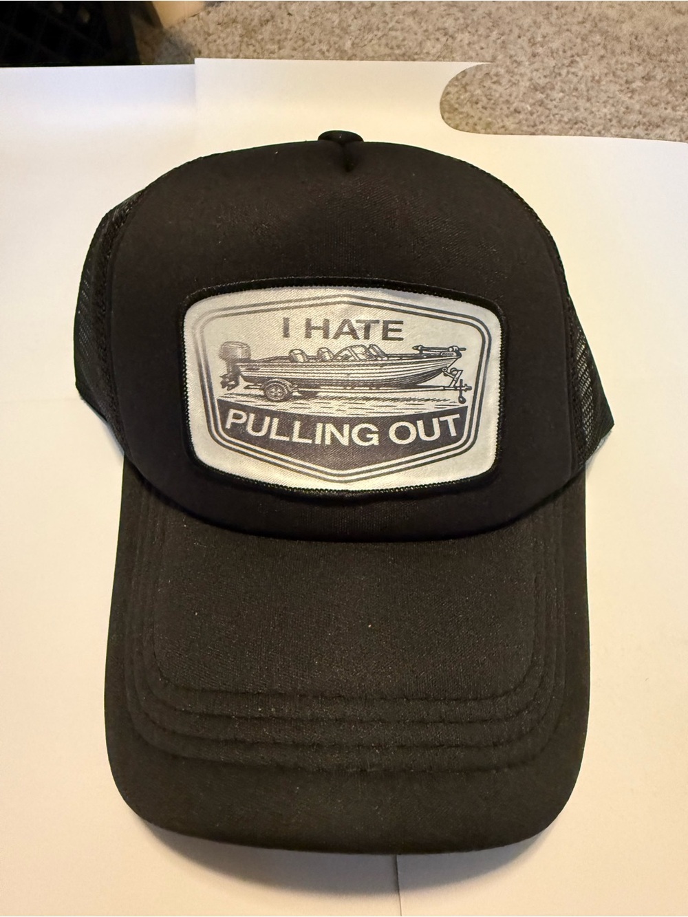 Black Trucker Hat with 'I Hate Pulling Out' Boat Patch